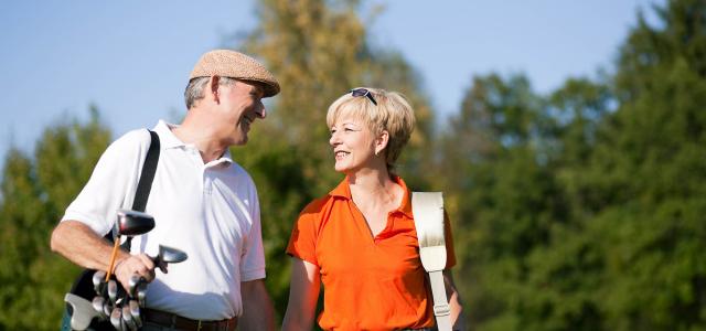 Retired Couple Playing Golf